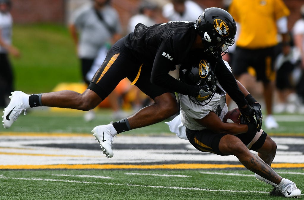Jordan Ulmer tackles Dominic Gicinto